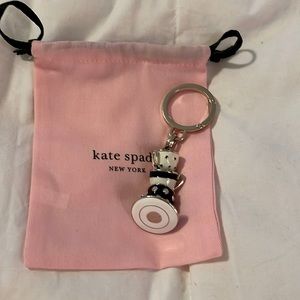 Kate Spade Alice in Wonderland Stacked Teacup Pendant Key Fob
